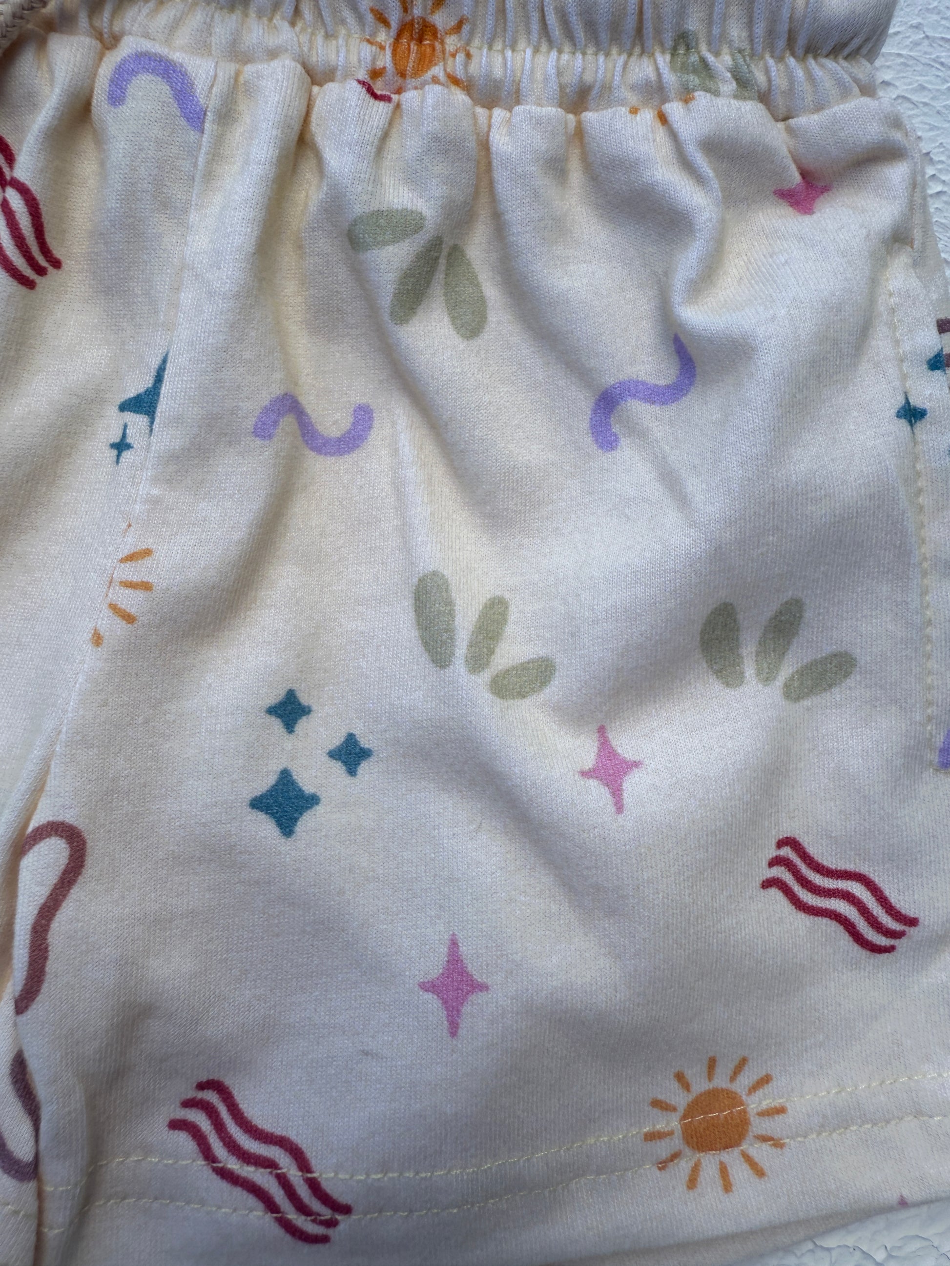 White fabric with colorful patterns on a white background