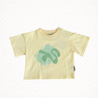 Yellow t-shirt with green abstract design on a white background