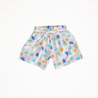 Children's shorts with colorful leaf pattern on a white background